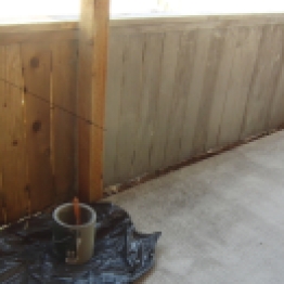 part of one side of driveway fence stained and sealed.