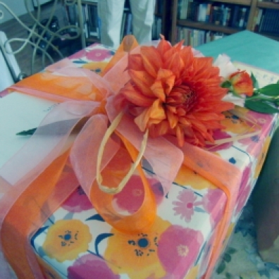 My daughter loves the wrapping as much as the gift. Fresh flowers.