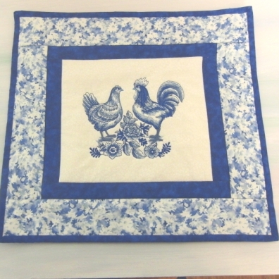 For my friends 80th birthday. She loves blue and white and chickens so I did the embroidery on my old machine.