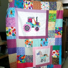Laurie made several of these appliqued quilts for kids.
