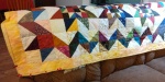 quilt across the couch